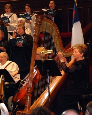 Alabama harpist playing in an orchestra.